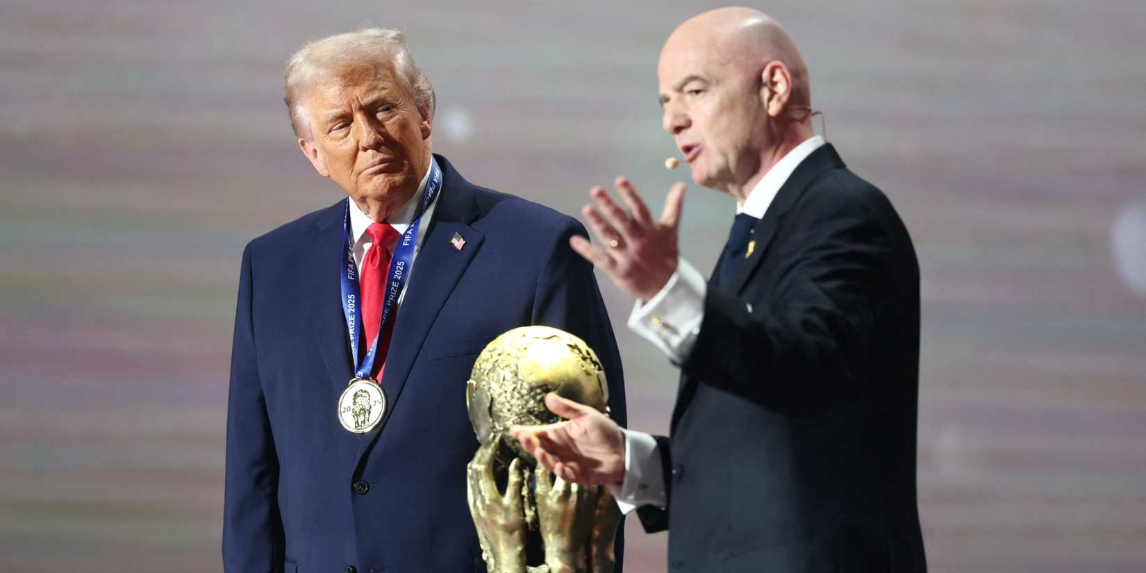 U.S. President Donald Trump on stage with FIFA President Gianni Infantino as he is awarded the FIFA Peace Prize