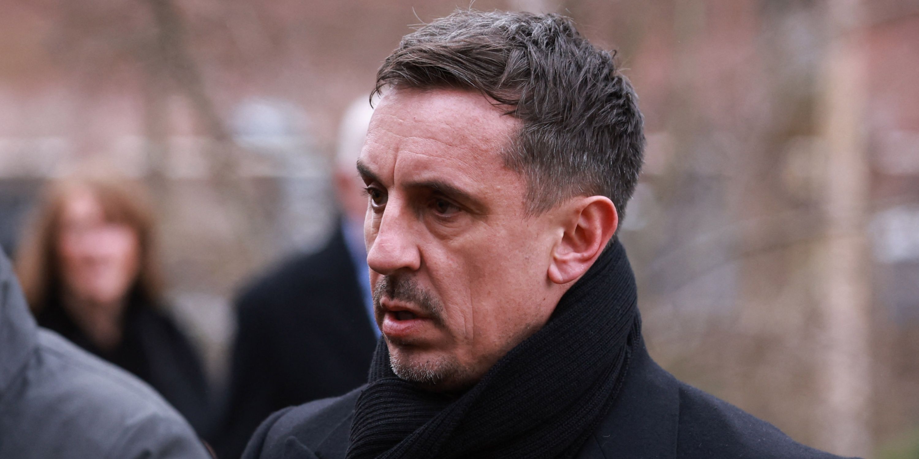 Gary Neville arrives to attend the funeral of Denis Law