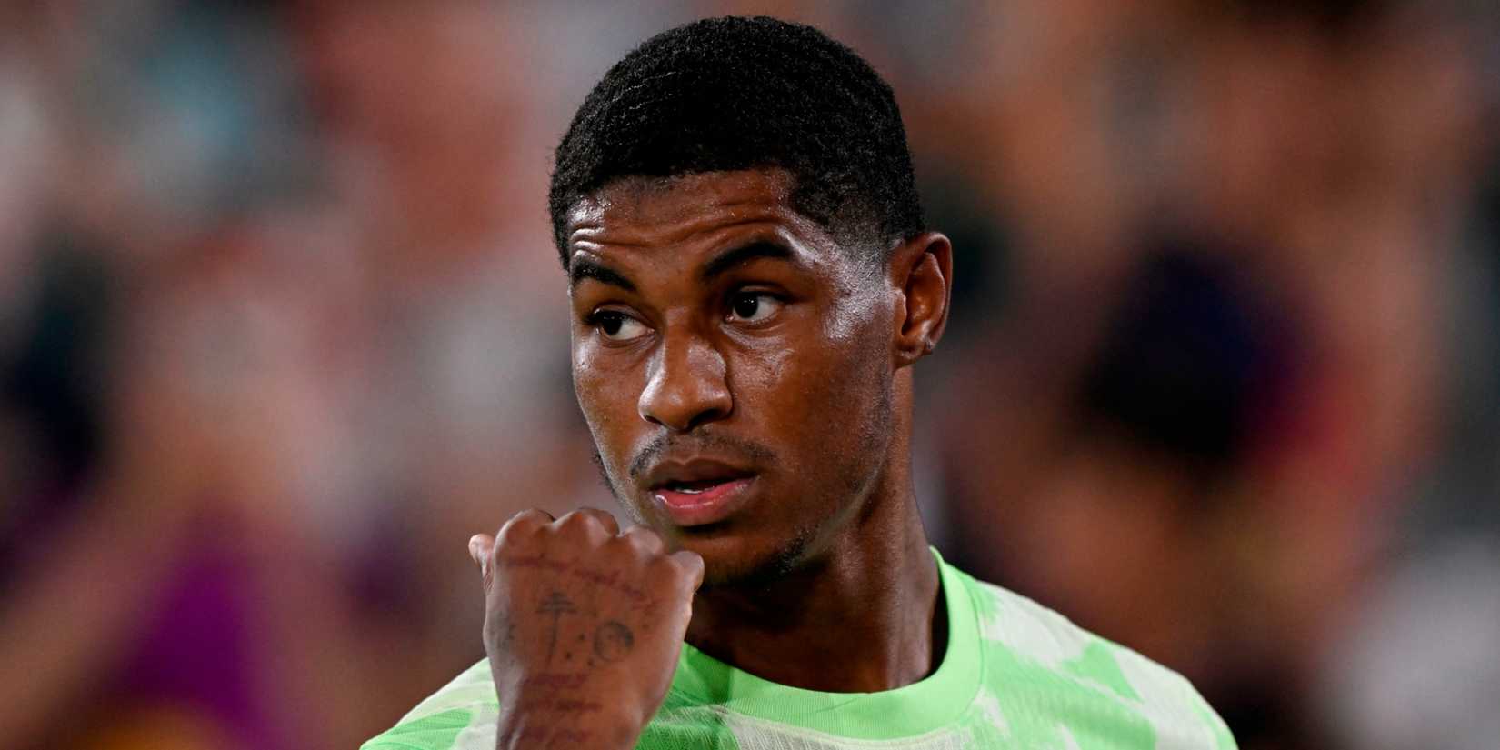 Barcelona's Marcus Rashford look on mid-game