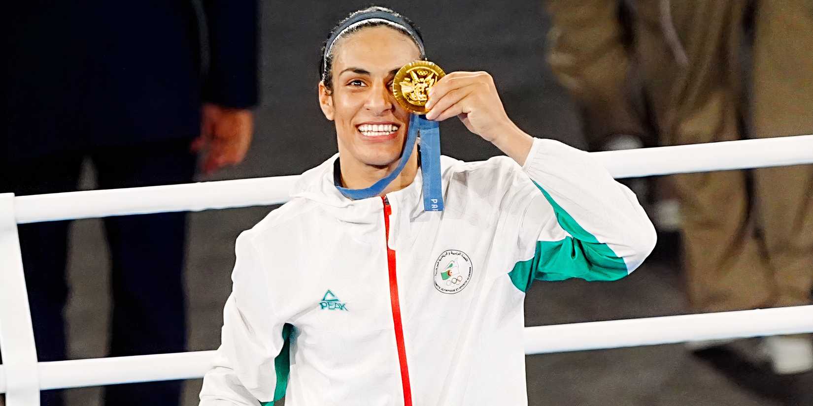 Imane Khelif celebrates with Olympic gold medal