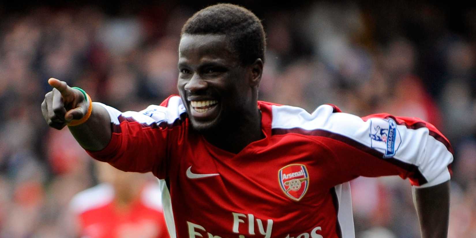 Arsenal's Emmanuel Eboue celebrates scoring against Burnley during their FA Cup fifth round