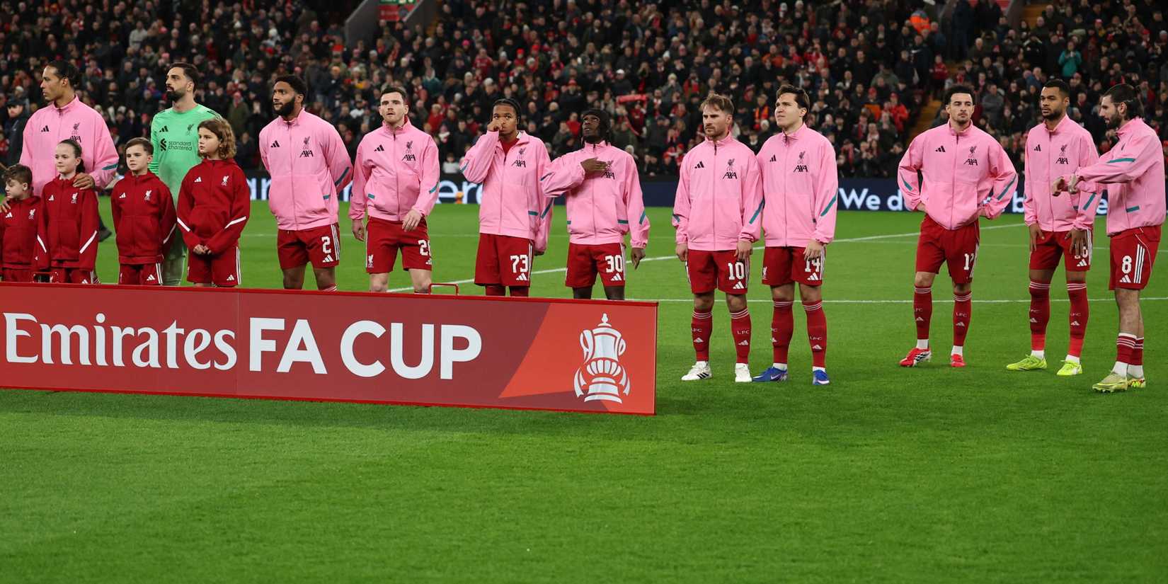 Liverpool players line up before facing Barnsley in the FA Cup.