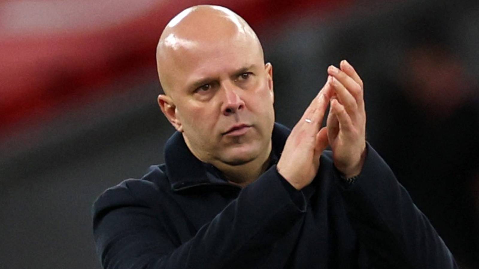 Liverpool manager Arne Slot celebrates after beating Barnsley