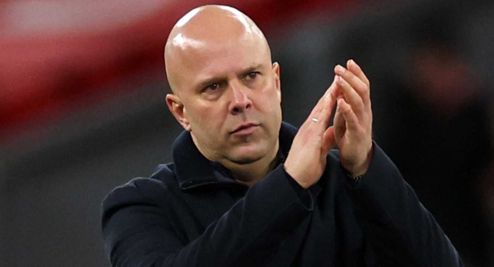 Liverpool manager Arne Slot celebrates after beating Barnsley