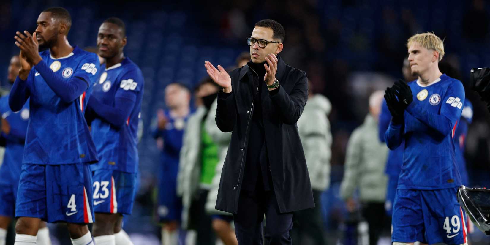 Chelsea manager Liam Rosenior looks dejected after the match