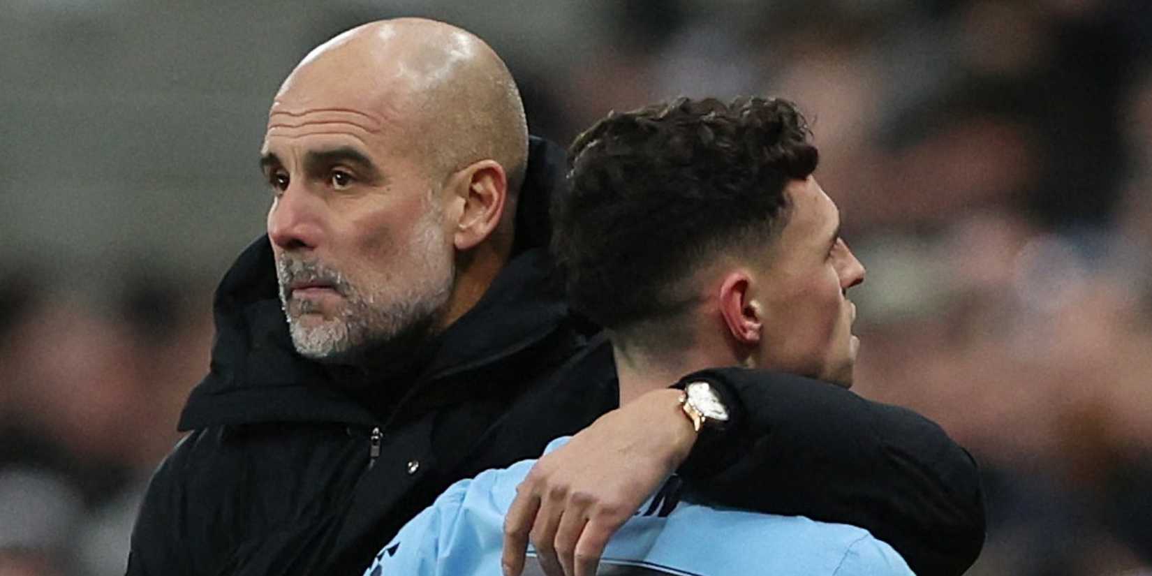 Manchester City's Phil Foden embraces Manchester City manager Pep Guardiola after being substituted vs Man Utd