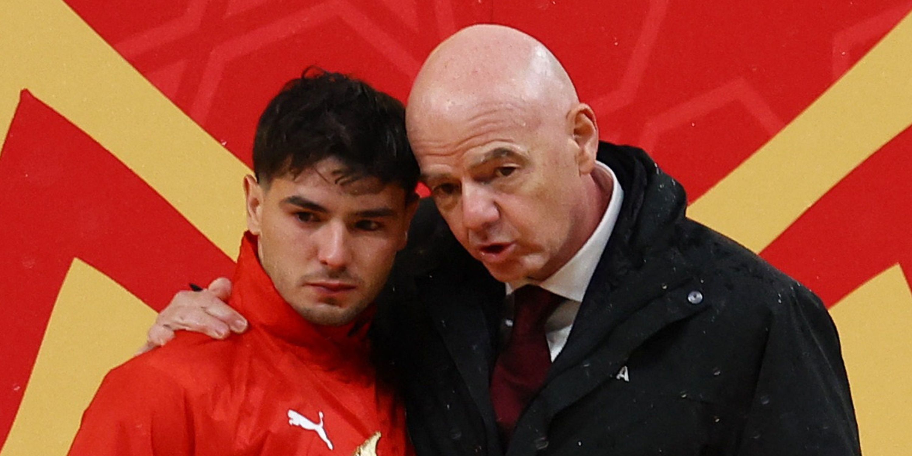 FIFA president Gianni Infantino delivers to Morocco's Brahim Diaz the Golden Boot trophy for AFCON