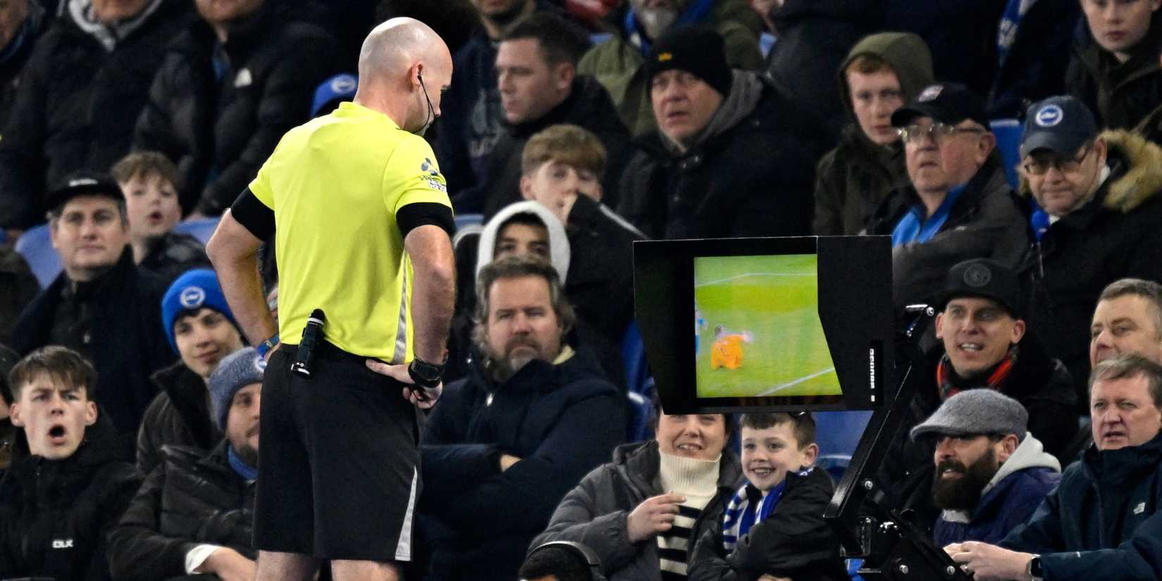Referee Paul Tierney looks at the VAR monitor
