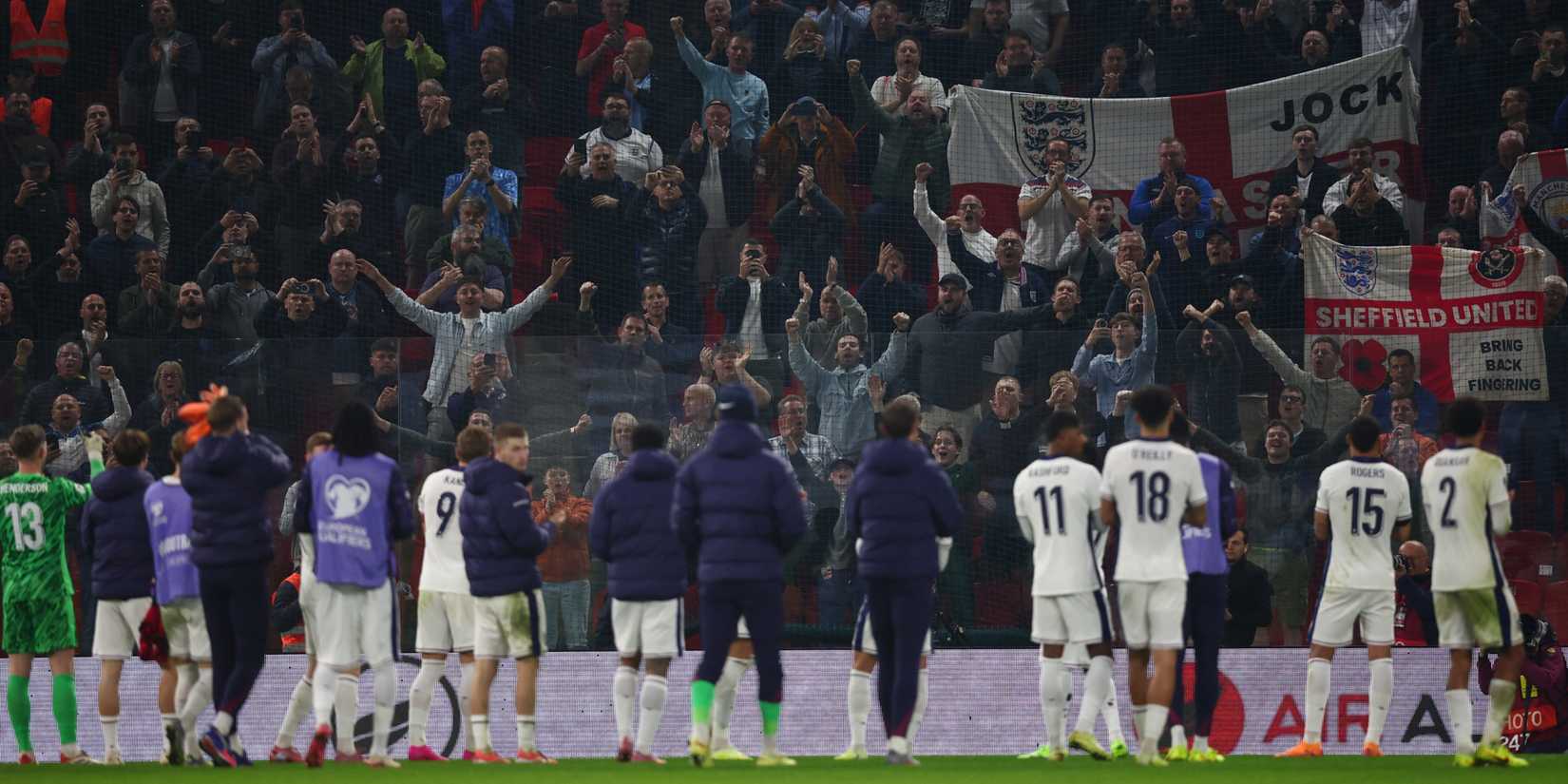 England players celebrates with fans after playing Albania