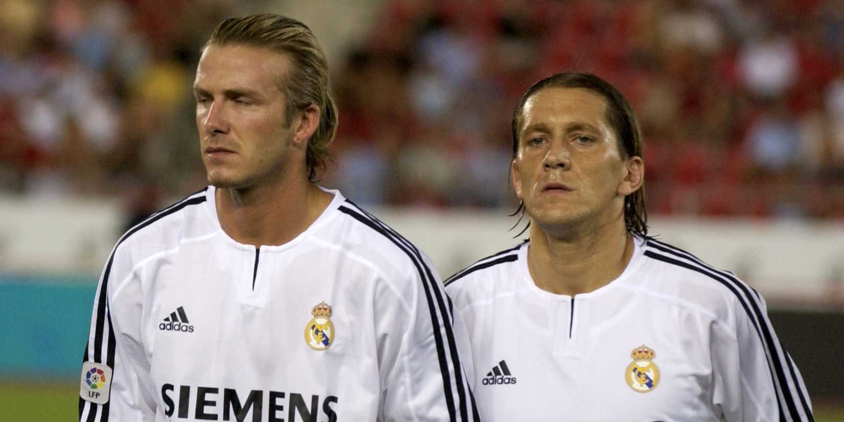 Real Madrid's David Beckham and Michel Salgado line up before playing Real Mallorca