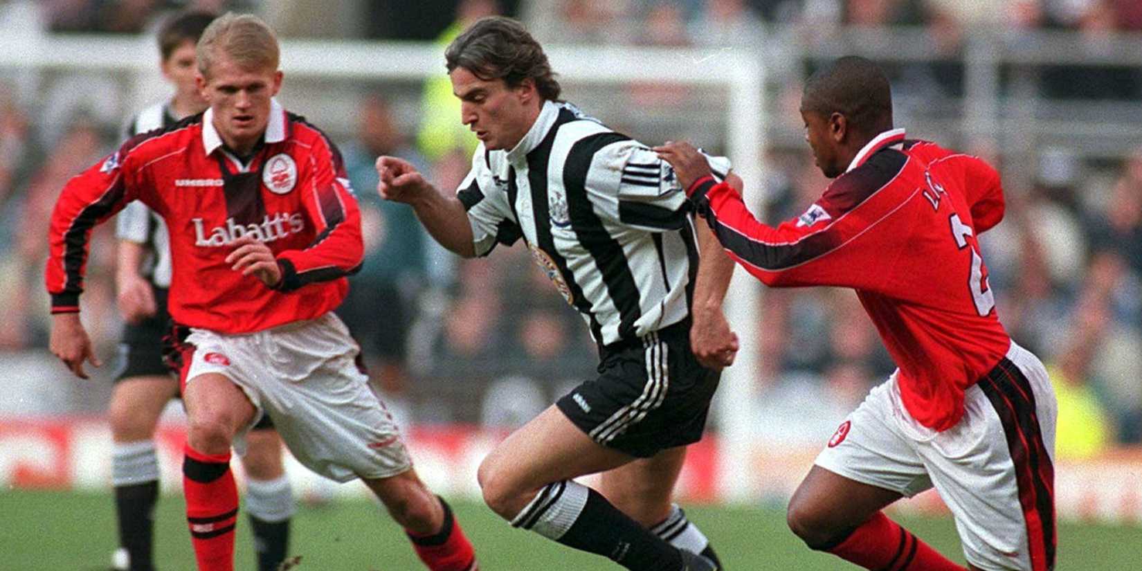 Newcastle's David Ginola takes on Forest's Allf Inge Haaland (Left) & Des Lyttle