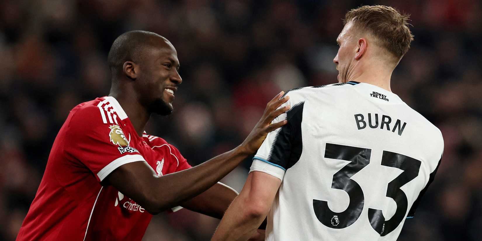 Liverpool's Ibrahima Konate with Newcastle United's Dan Burn