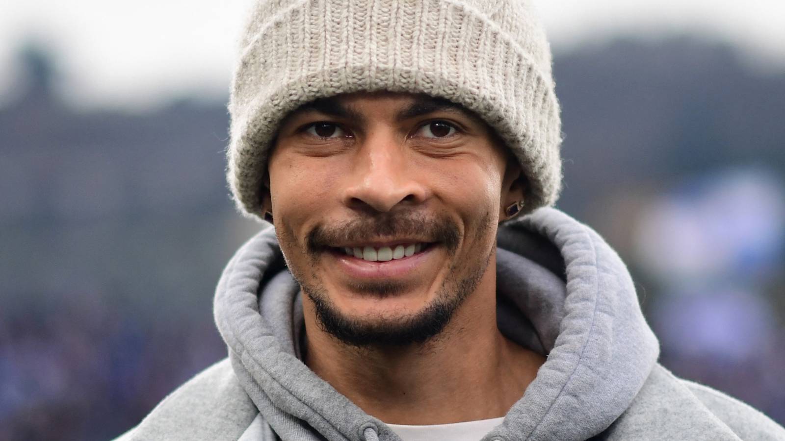 Dele Alli smiles during time with Como