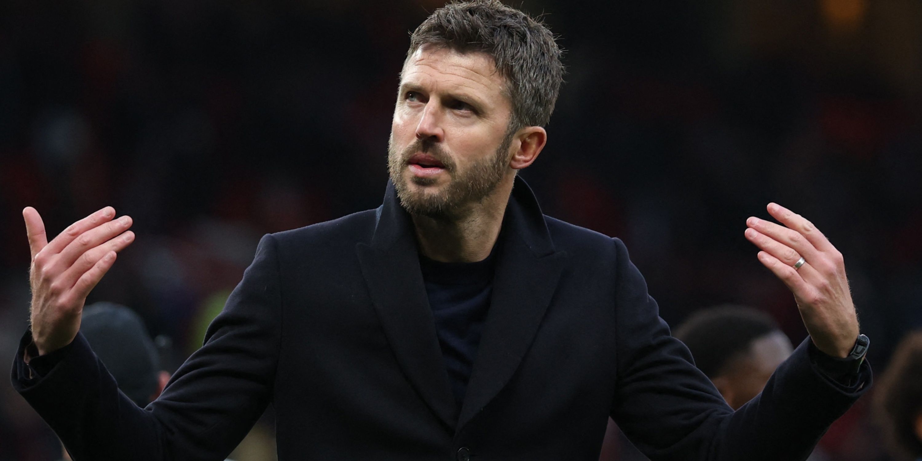 Manchester United caretaker manager Michael Carrick rouses the crowd