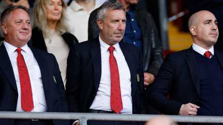 Manchester United senior officials Jason Wilcox and Omar Berrada look on