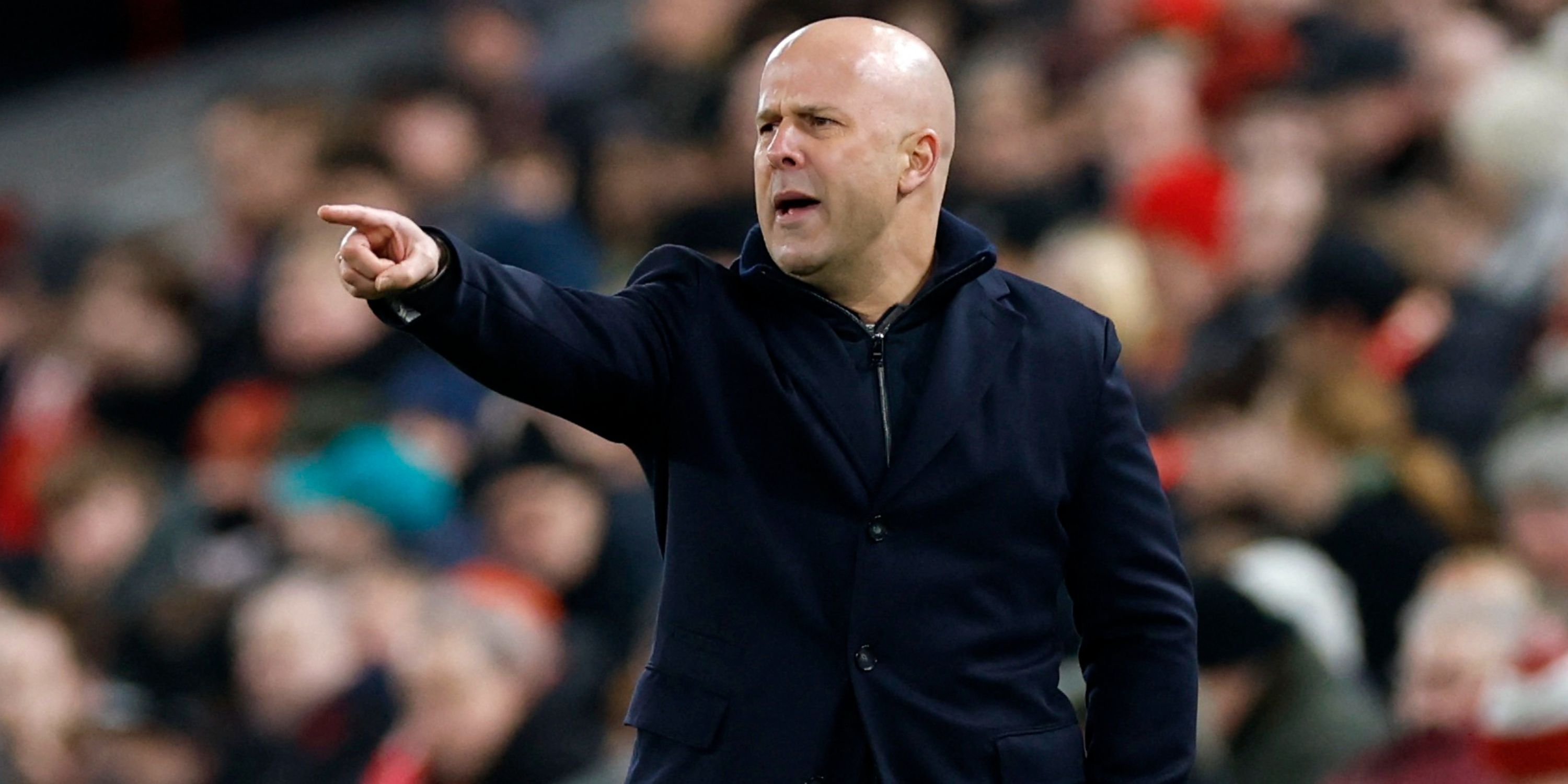 Liverpool manager Arne Slot pointing