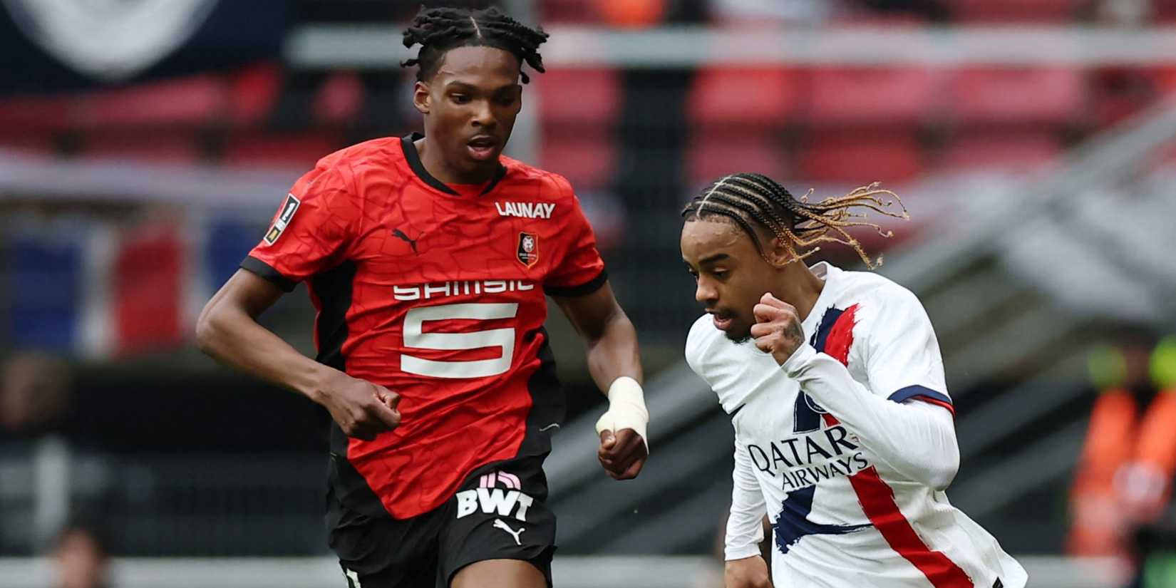 Stade Rennes' Jeremy Jacquet in action with Paris St Germain's Bradley Barcola