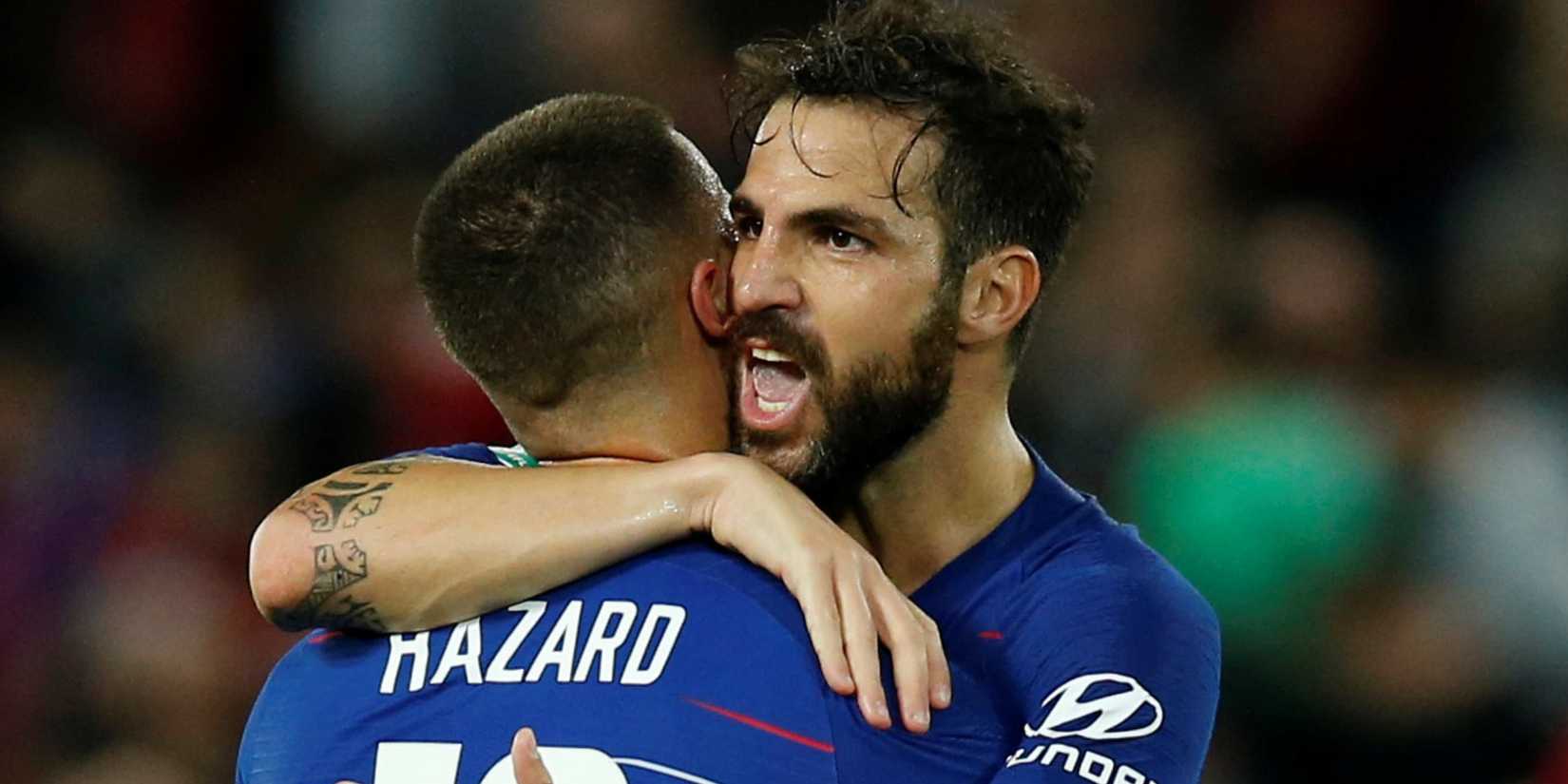 Chelsea's Eden Hazard celebrates with Cesc Fabregas after the match