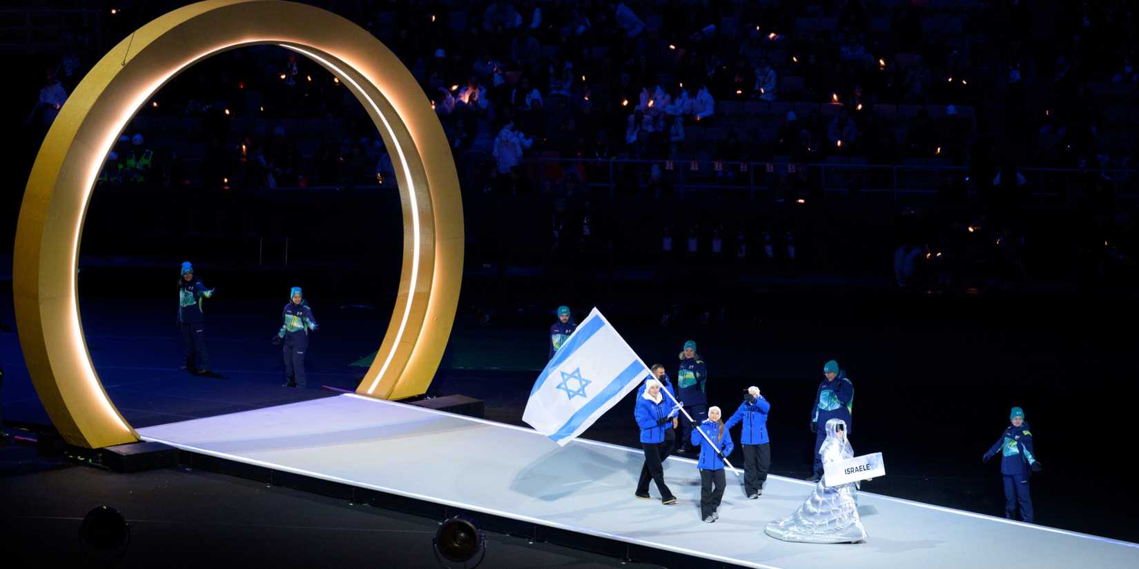 Flag bearer Mariia Seniuk of Israel during the Opening Ceremony of the 2026 Winter Olympics