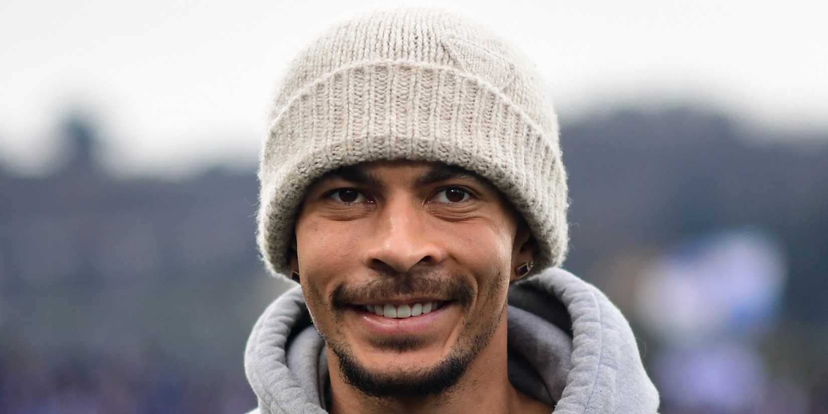 Dele Alli smiles after completing his move to Como