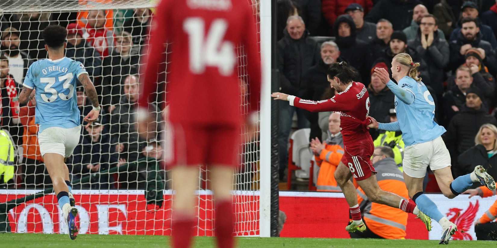 Liverpool v Manchester City - Anfield, Liverpool, Britain - February 8, 2026 Liverpool's Dominik Szoboszlai is challenged by Manchester City's Erling Haaland as Rayan Cherki scores a goal which is later disallowed before Szoboszlai is sent off upon VAR review for an earlier offence