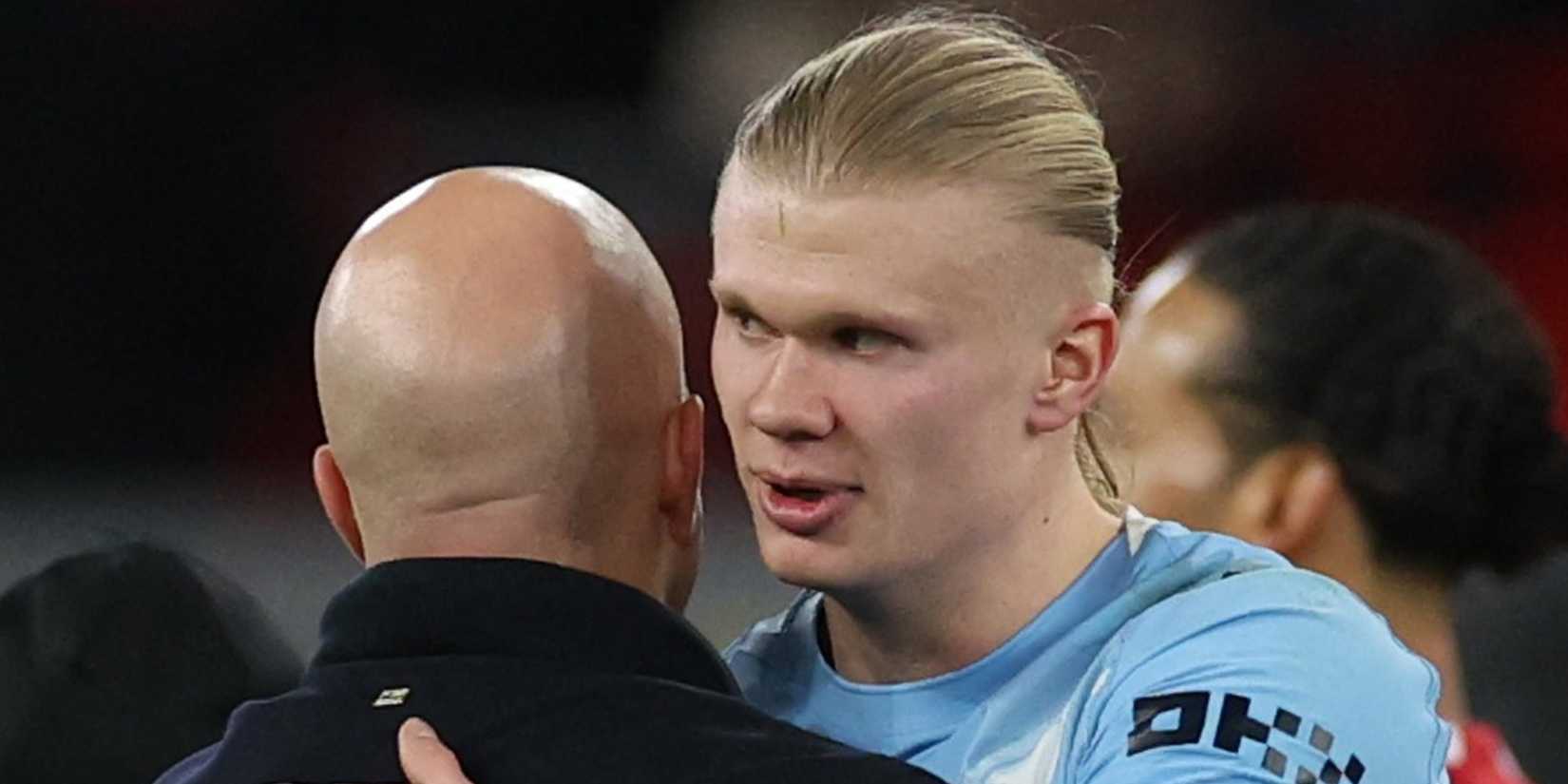 Liverpool manager Arne Slot hugs Manchester City's Erling Haaland
