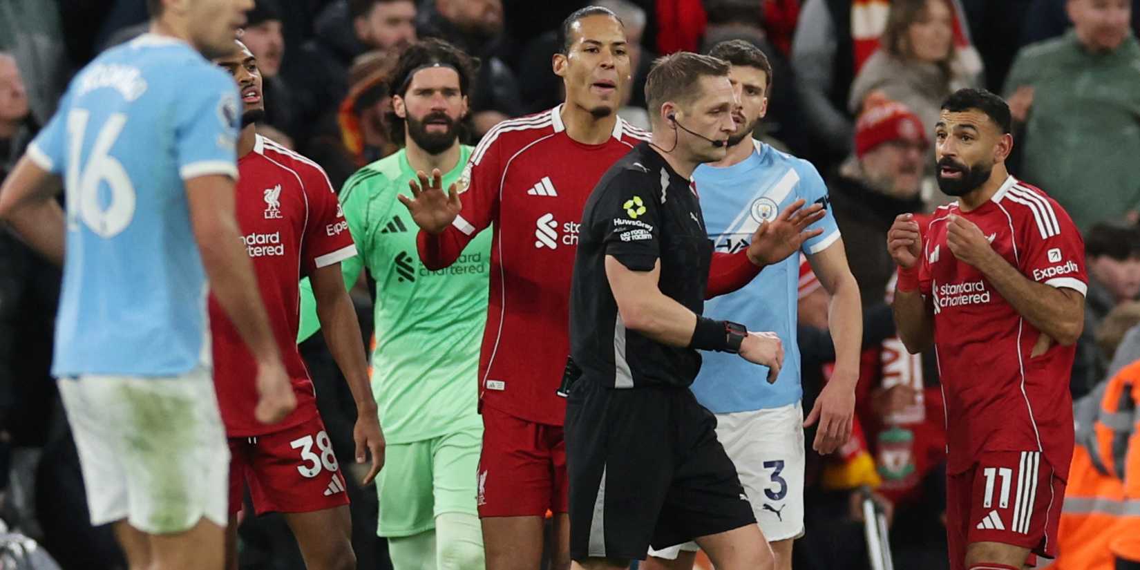 Liverpool's Virgil van Dijk and Mohamed Salah react after referee Craig Pawson awards a penalty to Manchester City