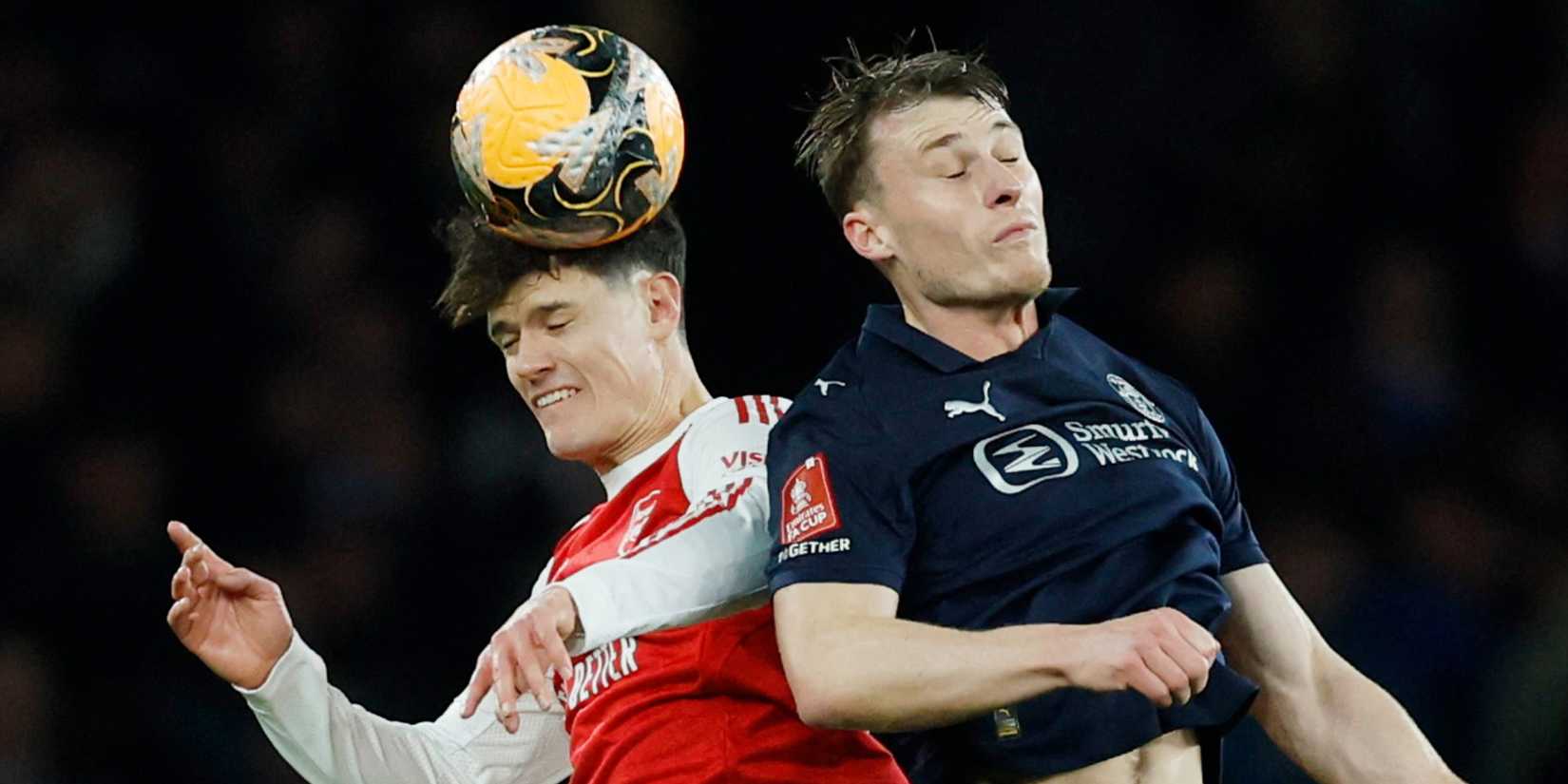 Arsenal's Christian Norgaard in action with Wigan Athletic's Owen Moxon