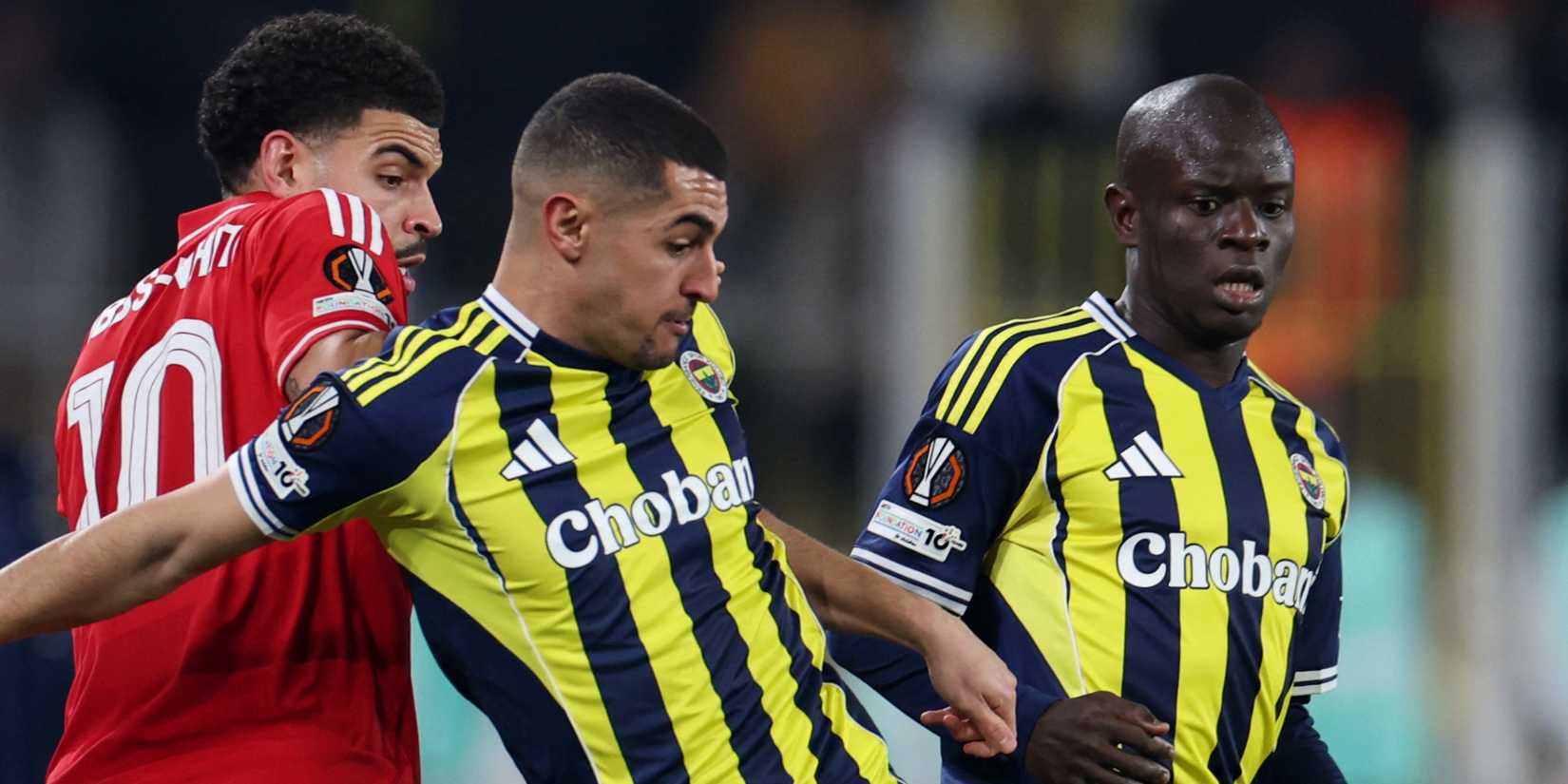 Fenerbahce's Munir Mercan and N'Golo Kante in action with Nottingham Forest's Morgan Gibbs-White