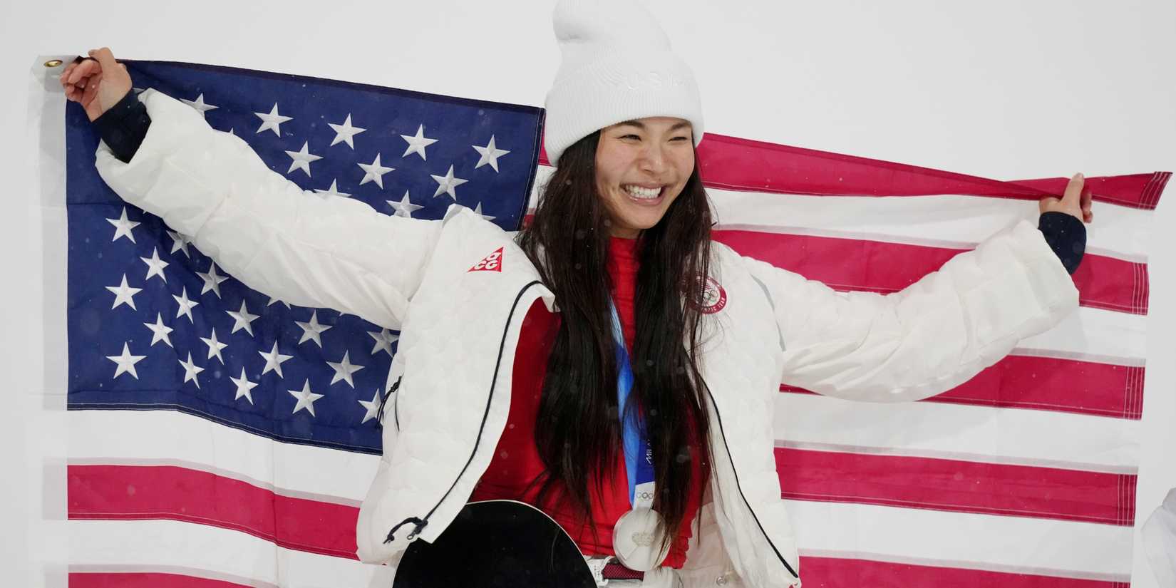 Chloe Kim of the United States celebrates her silver medal in the women's halfpipe final during the Milano Cortina 2026 Olympic Winter Games