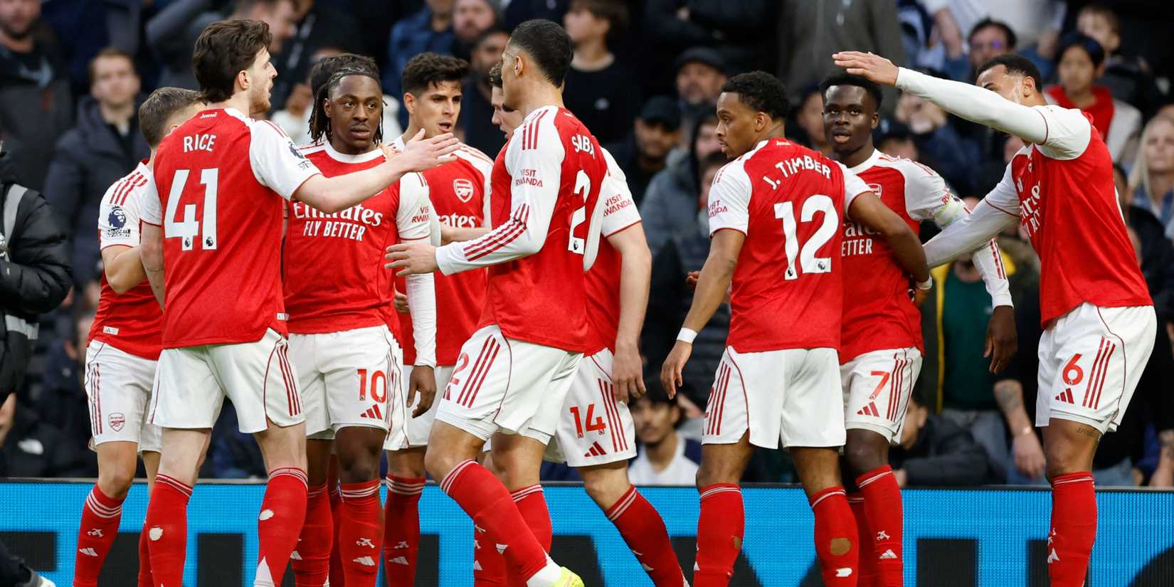 Arsenal players celebrate vs Tottenham