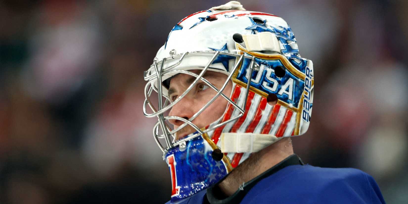 Jeremy Swayman of United States against Denmark in men's ice hockey group C play during the Milano Cortina 2026 Olympic Winter Games