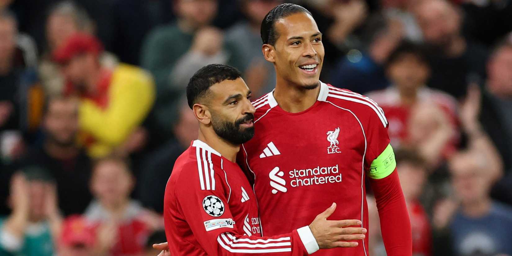 Liverpool's Mohamed Salah celebrates scoring their second goal with Virgil van Dijk