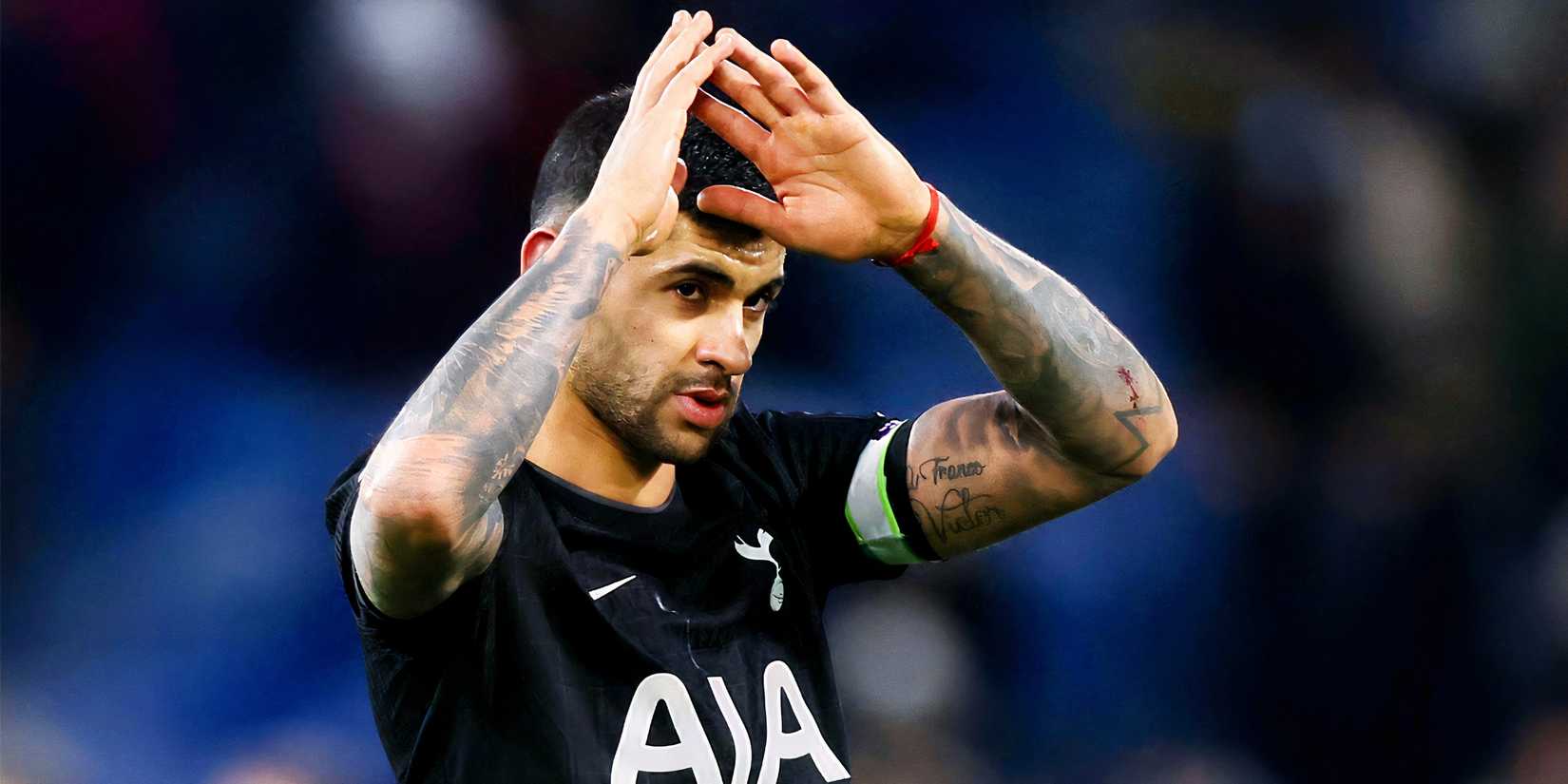 Cristian Romero gestures during a Tottenham match