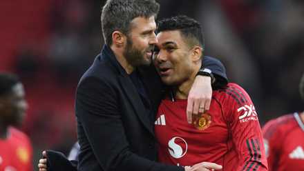 Manchester United caretaker manager Michael Carrick embraces Casemiro