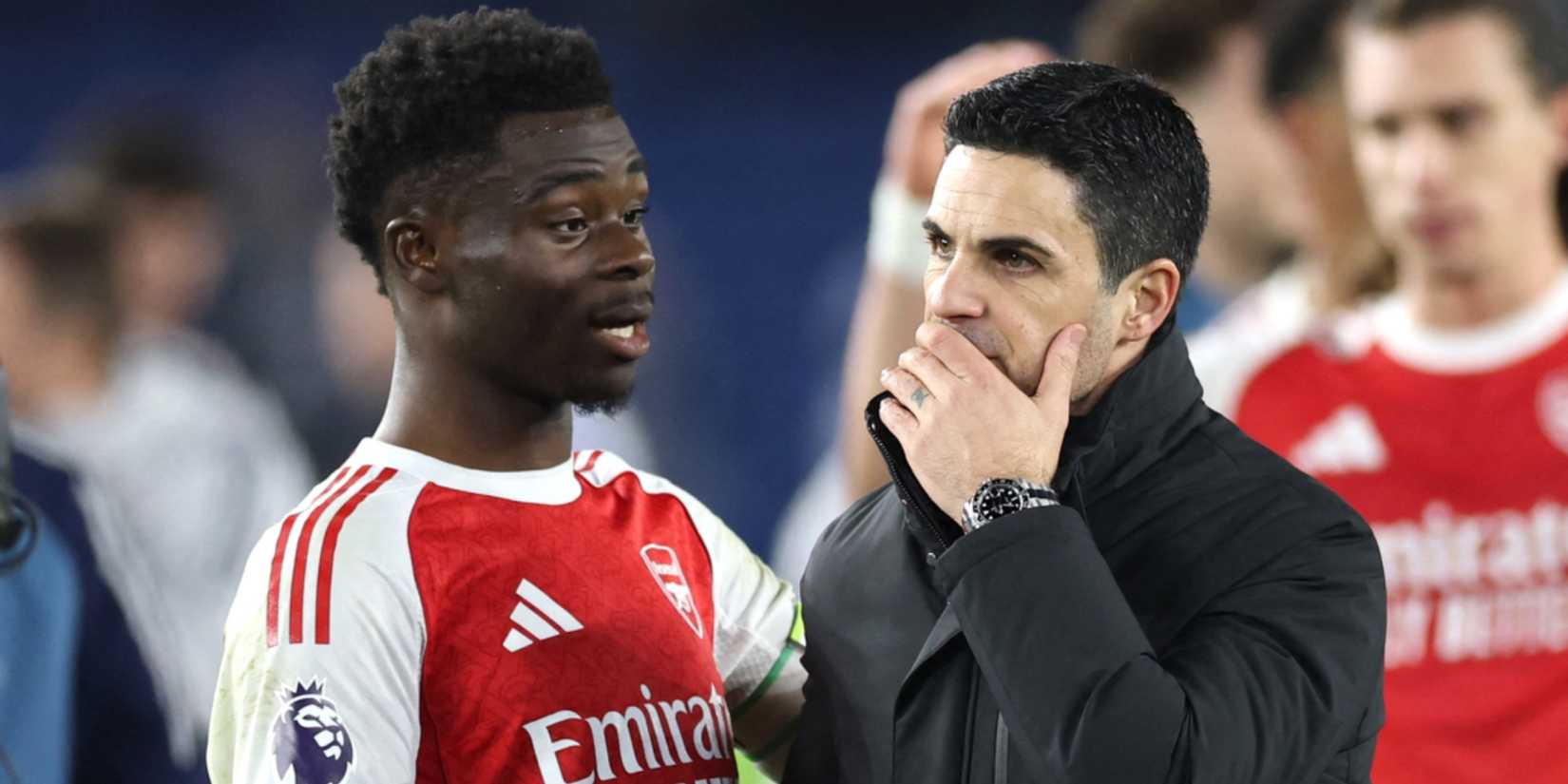 Bukayo Saka and Mikel Arteta
