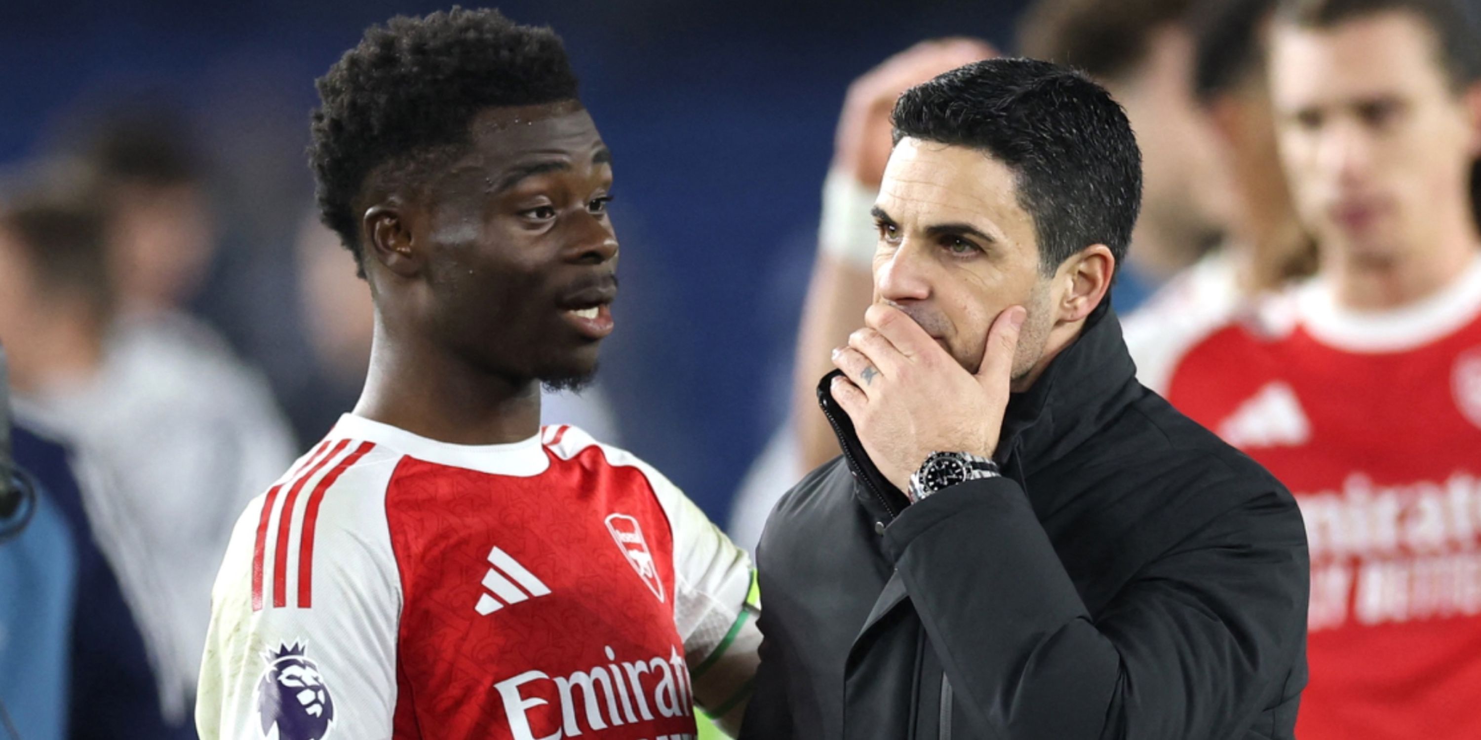 Bukayo Saka and Mikel Arteta