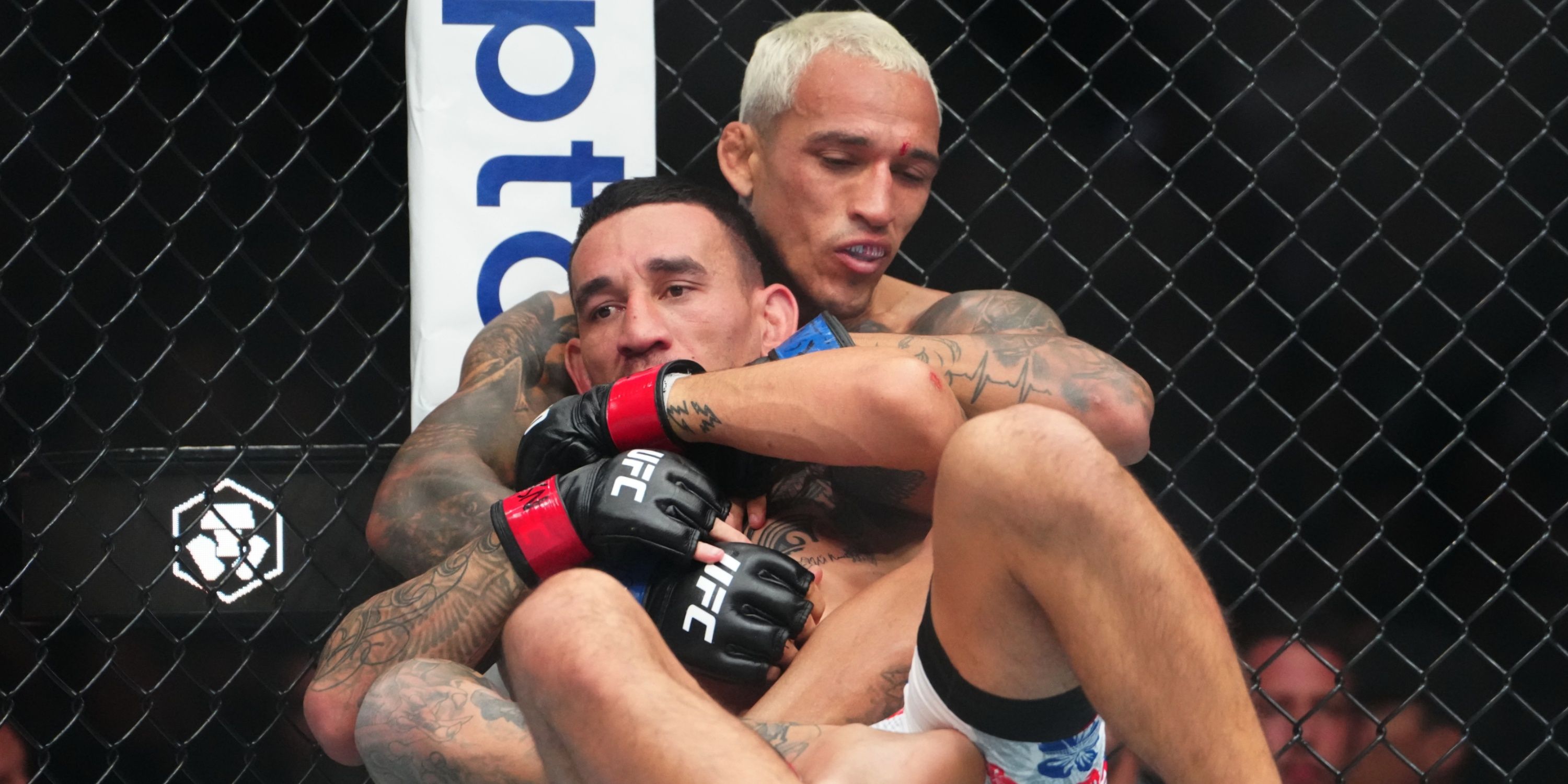 Charles Oliveira and Max Holloway