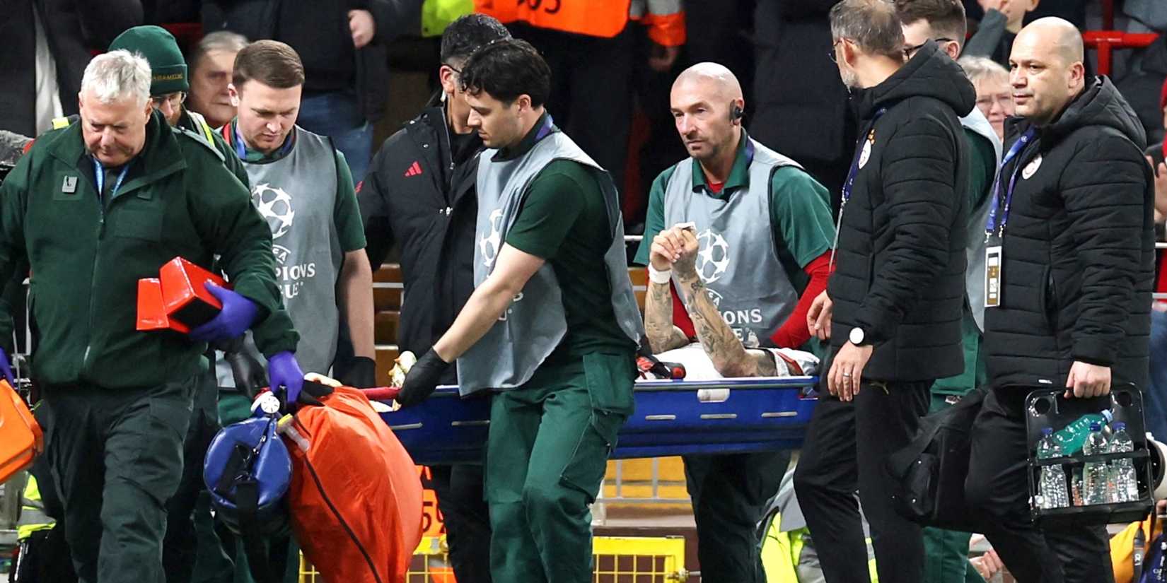 Noa Lang stretchered off at Anfield