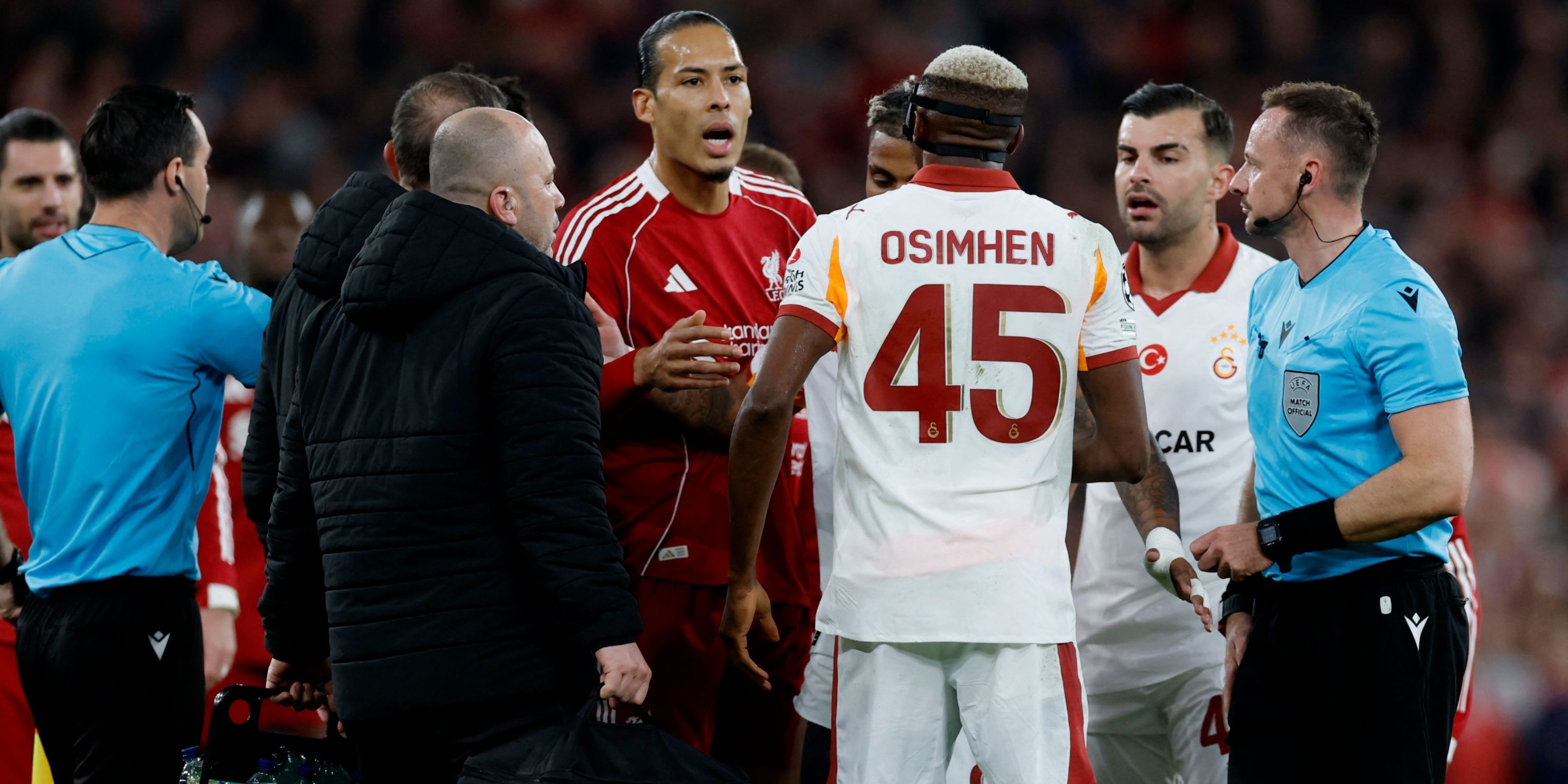 Virgil van Dijk and Victor Osimhen argue during Liverpool vs Galatasaray