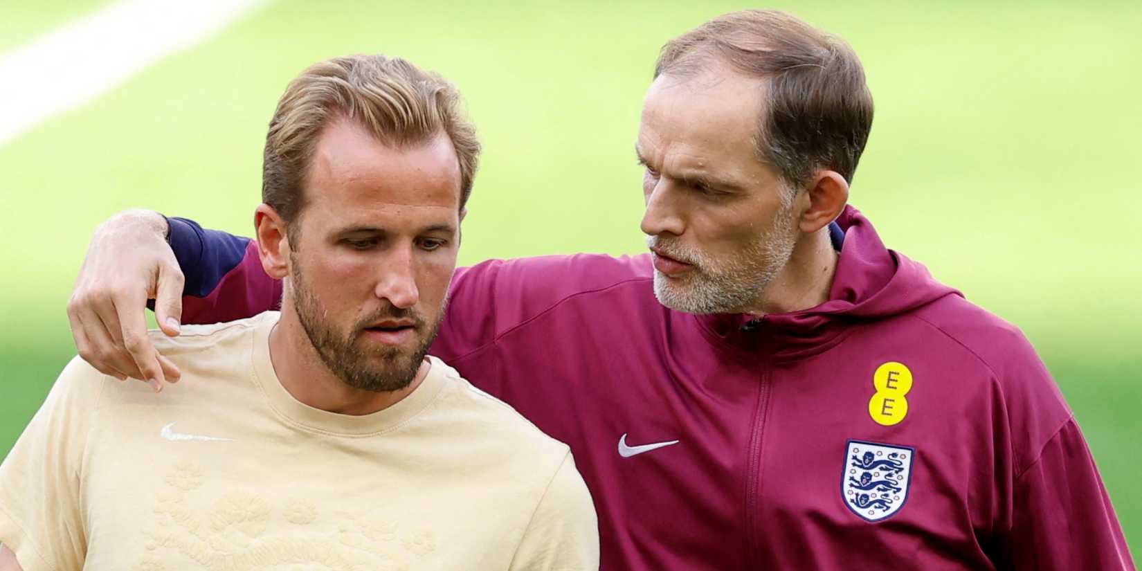 Thomas Tuchel and England's Harry Kane talk on a training pitch