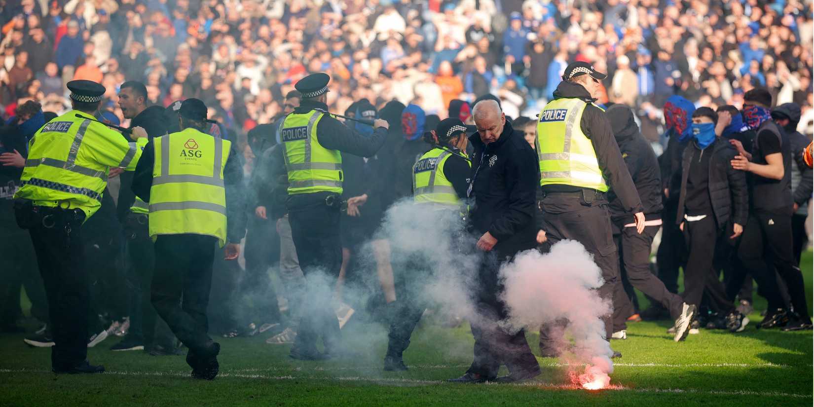 Celtic and Rangers fans clash as police try to calm proceedings