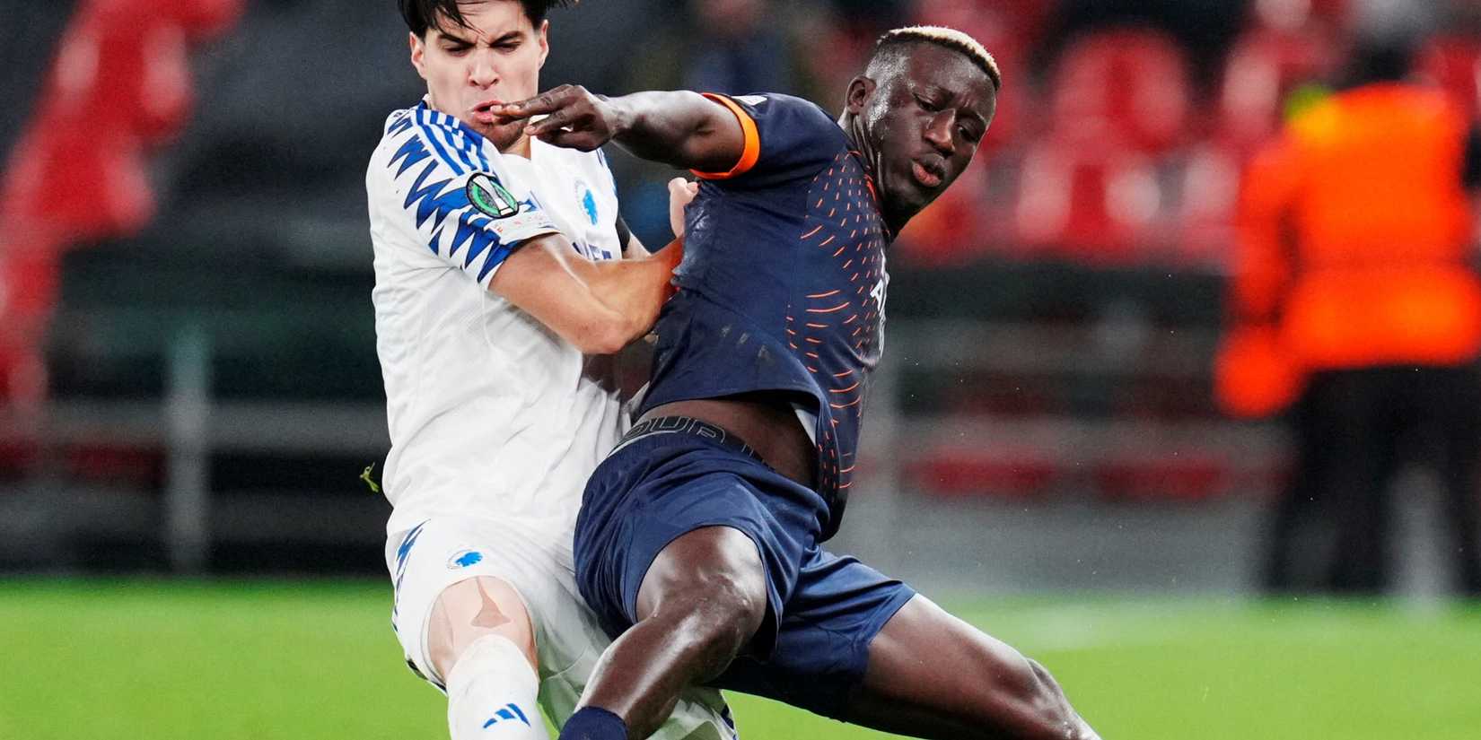 Philippe Keny battles for the ball