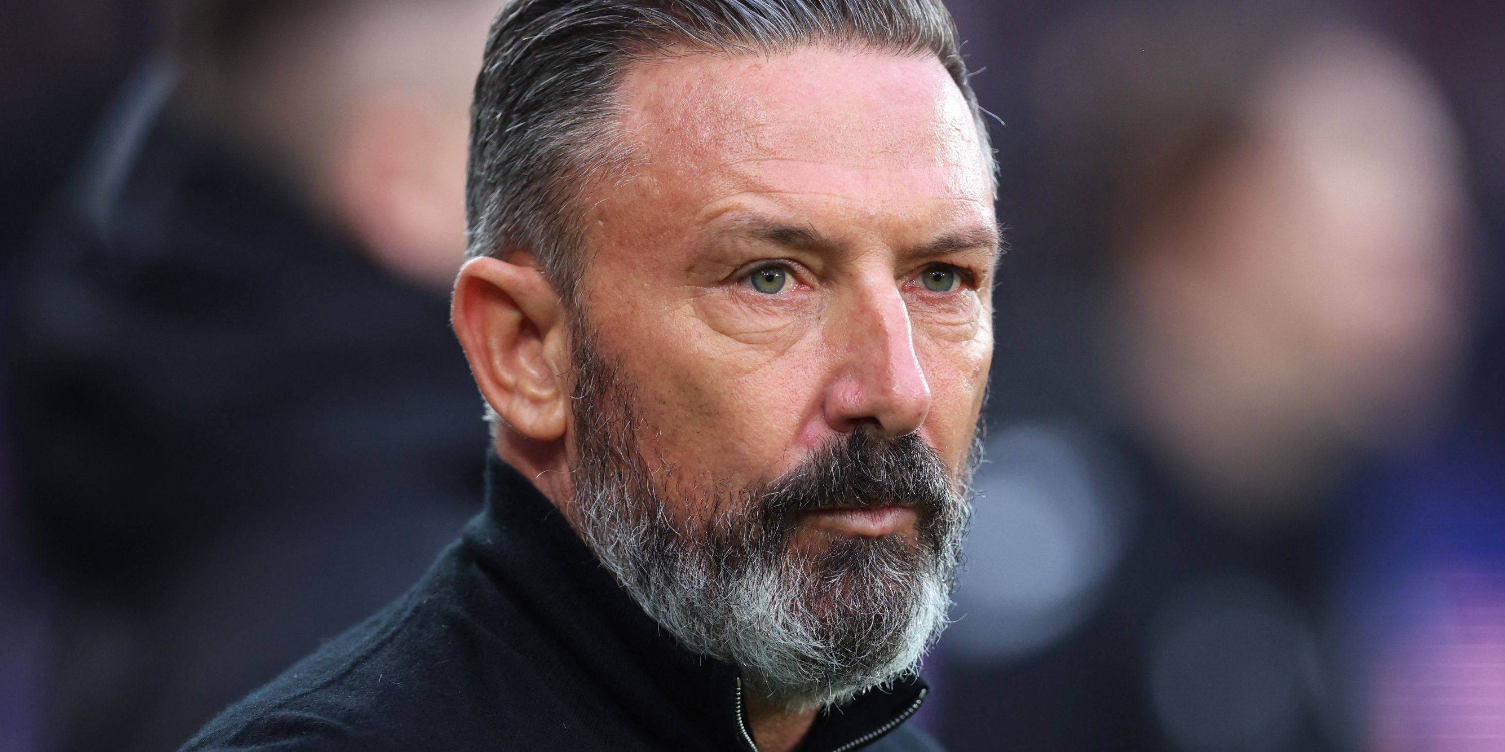 Hearts manager Derek McInnes looks on