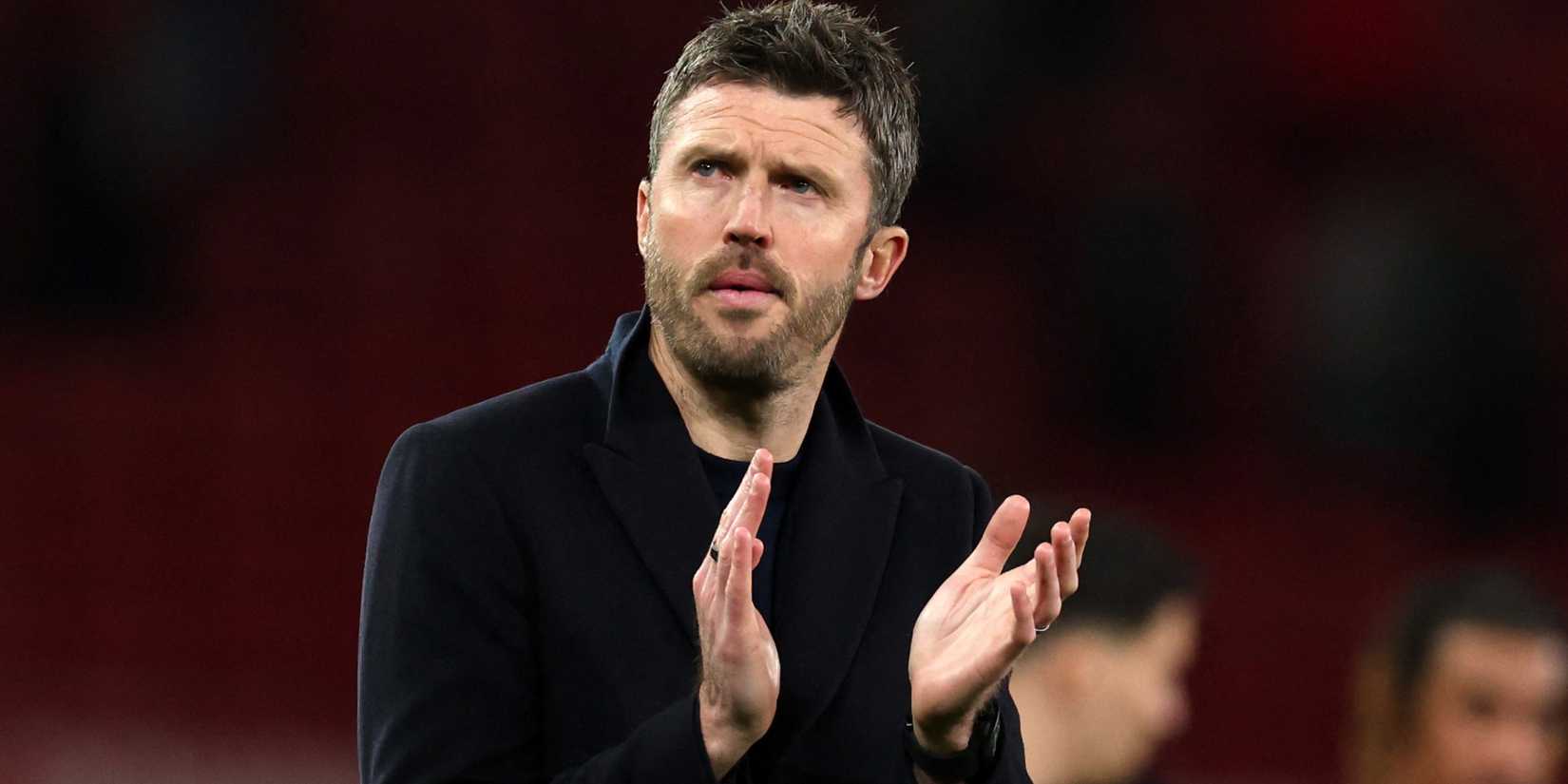 Manchester United caretaker manager Michael Carrick claps the fans