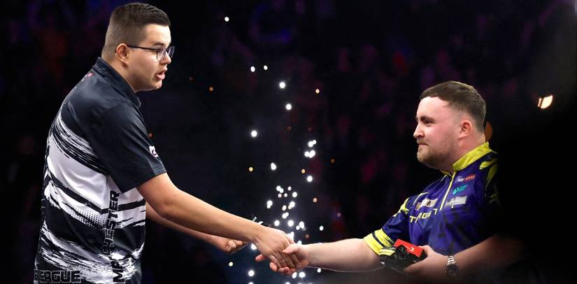 Luke Littler and Gian van Veen shake hands after tense clash