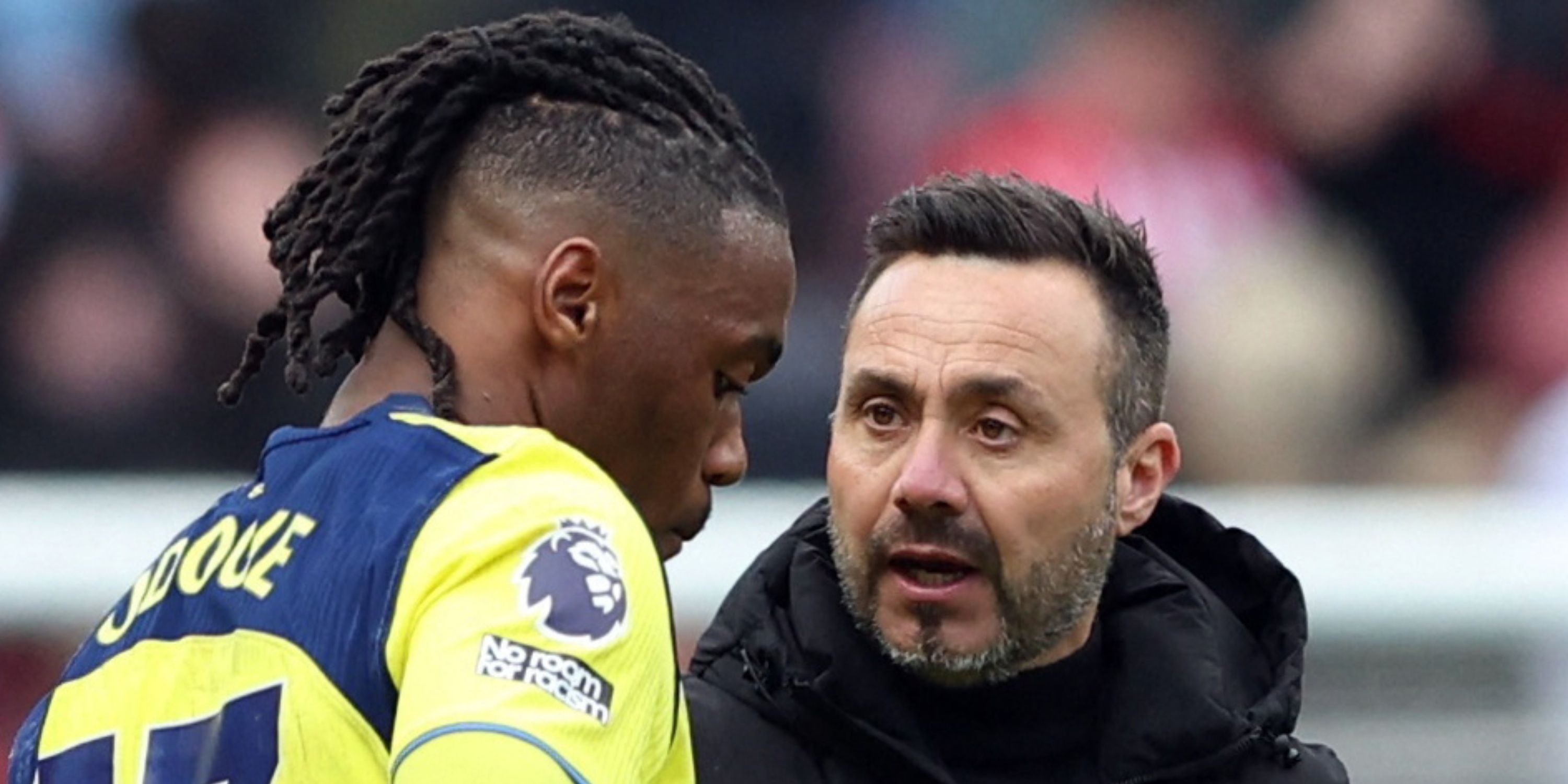 Tottenham Hotspur manager Roberto De Zerbi speaks to Destiny Udogie after the match vs Sunderland