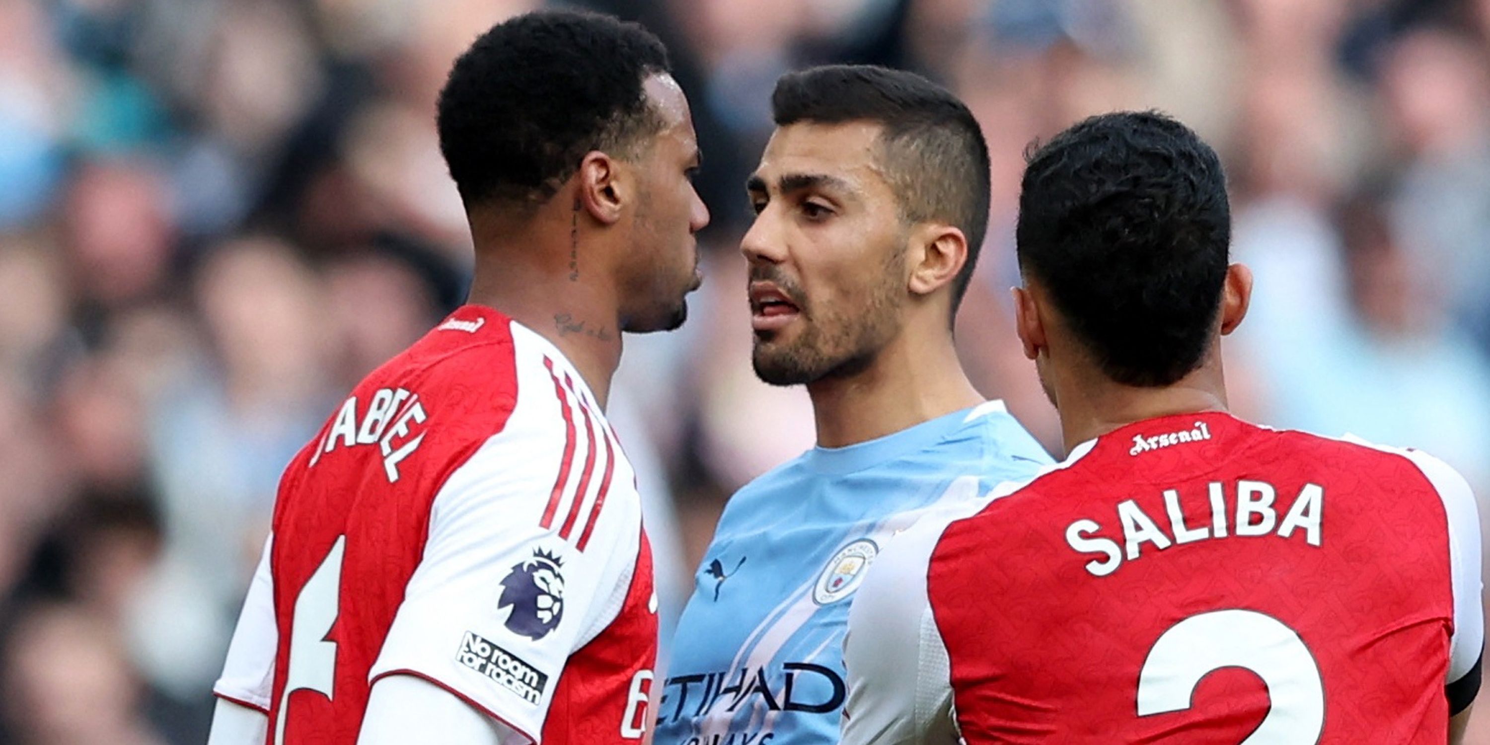 Arsenal's Gabriel clashes with Manchester City's Rodri