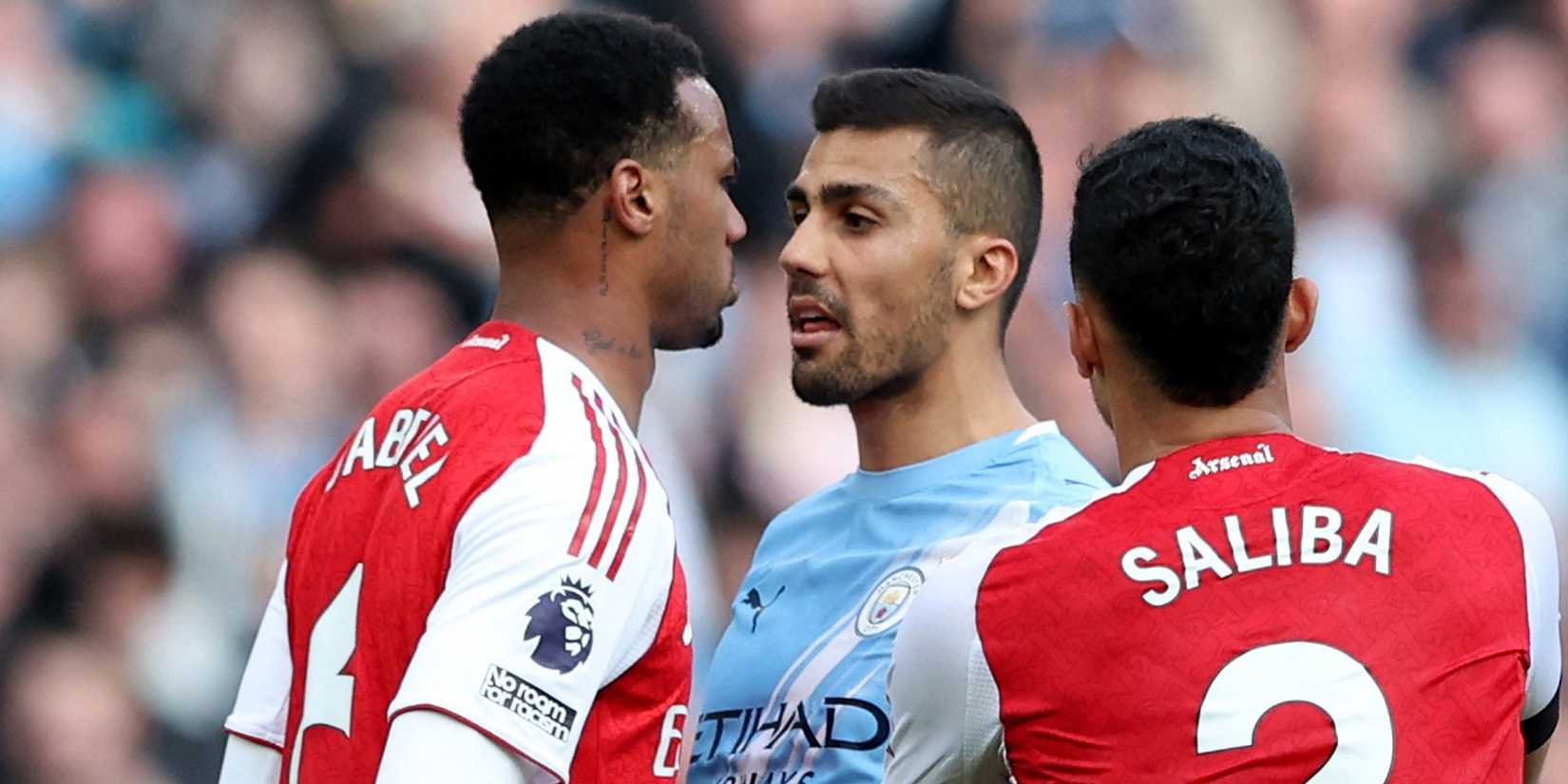Arsenal's Gabriel clashes with Manchester City's Rodri