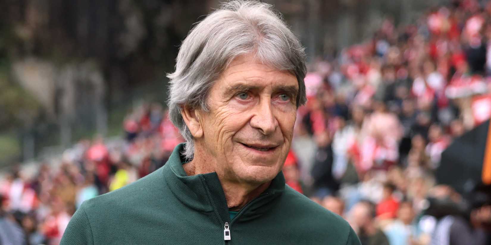 Real Betis coach Manuel Pellegrini smiles